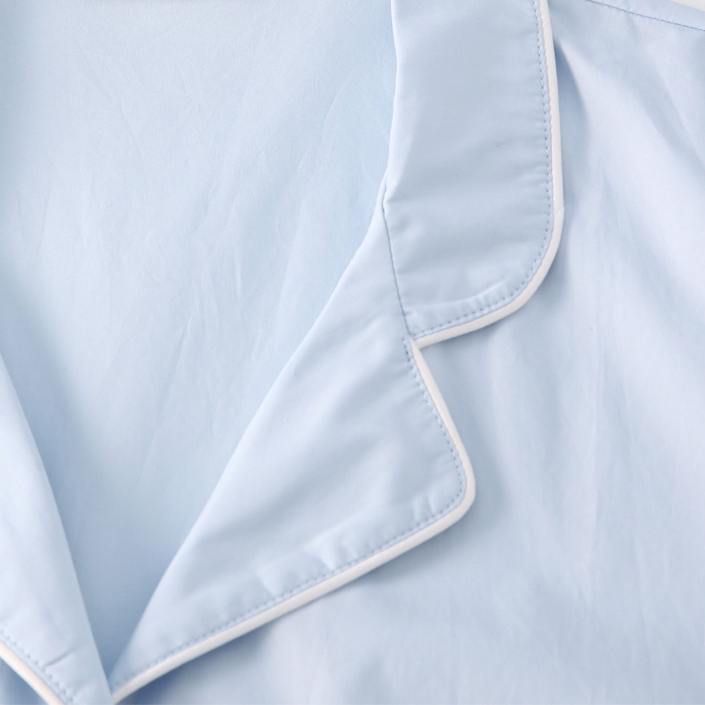 Cotton pajama top high quality stitching detail.