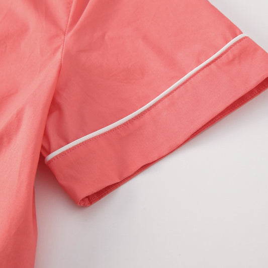 Cotton pajama short sleeve detail in coral orange colour.