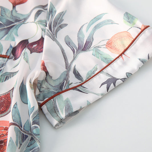 Satin pajama top short sleeve red piping detail.