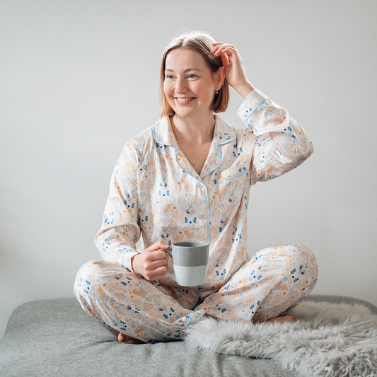 Aroha Golden Kiwi Pajama sitting down